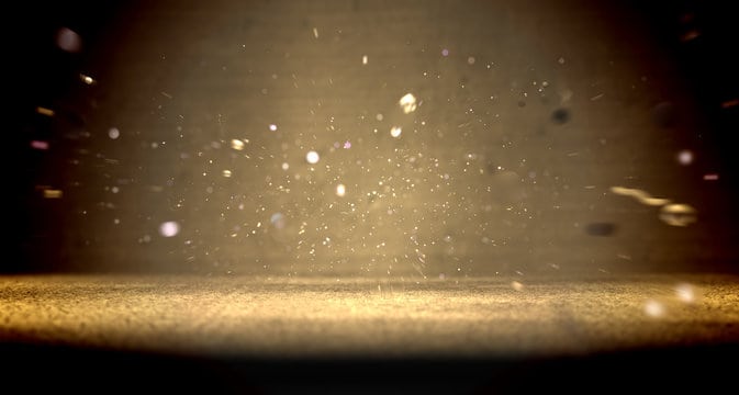 Fondo abstracto.Suelo de cemento y pared en la oscuridad.Luz de foco y polvo en el ambiente.