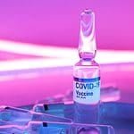 Glass clean ampoule with vaccine for COVID 19
